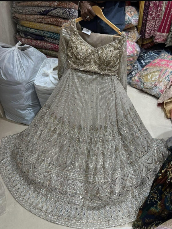 Golden whilte lehenga with unique work